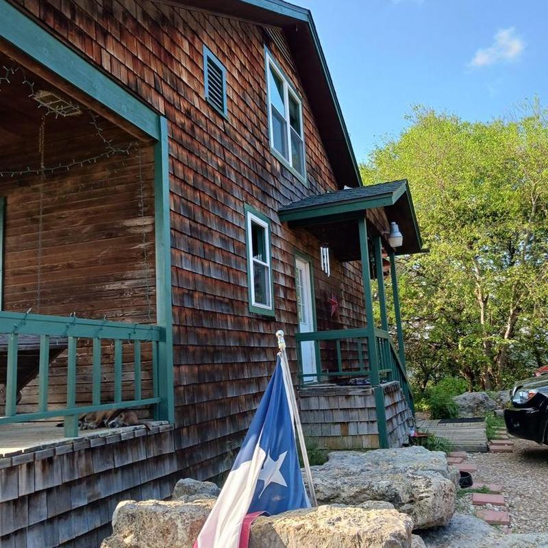 Cedar shake siding on house exterior with porch