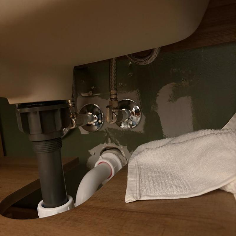 Lav faucet shutoff valves and drain installation under vanity