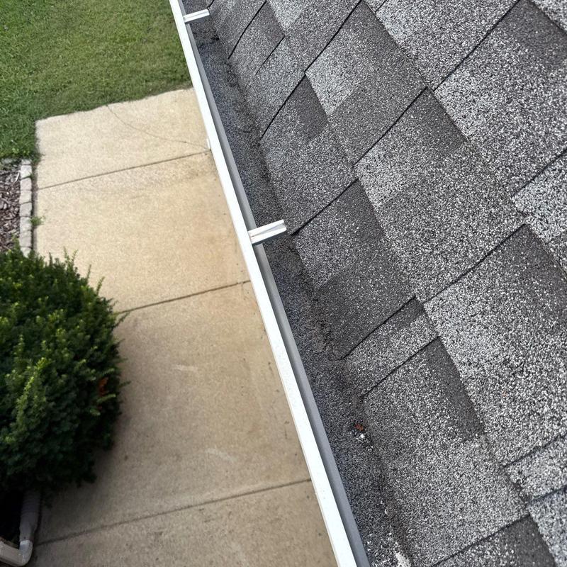 Asphalt shingles with hail damage on residential roof