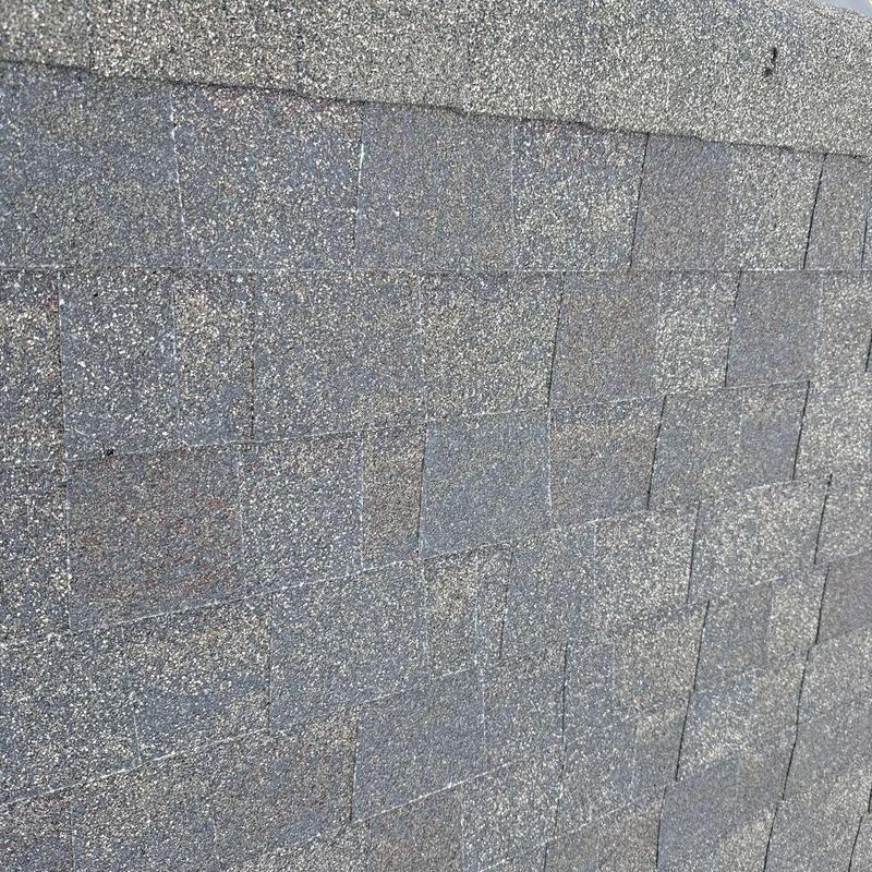 Asphalt shingle roof with hail damage granule loss