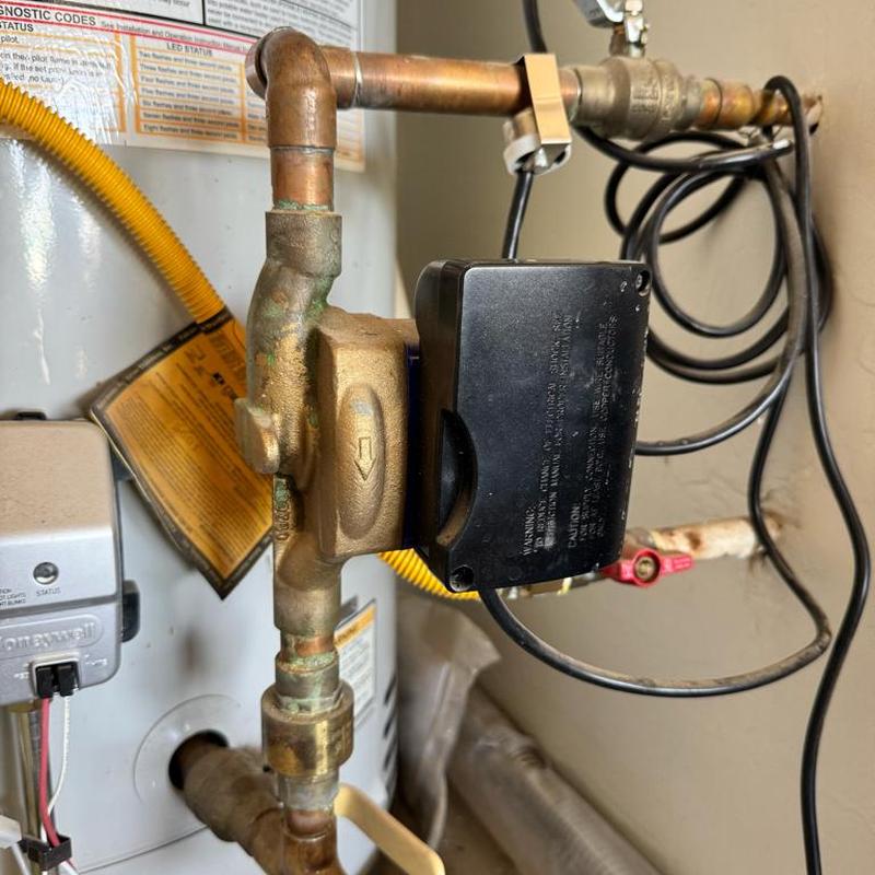 Recirculation pump purged of air near water heater
