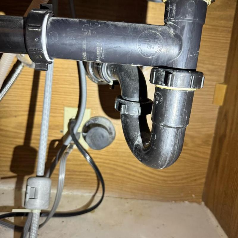 Kitchen sink P-trap and drain line blockage cleared
