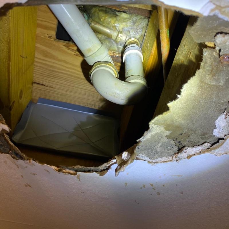 Trip waste assembly and valve under ceiling access hole