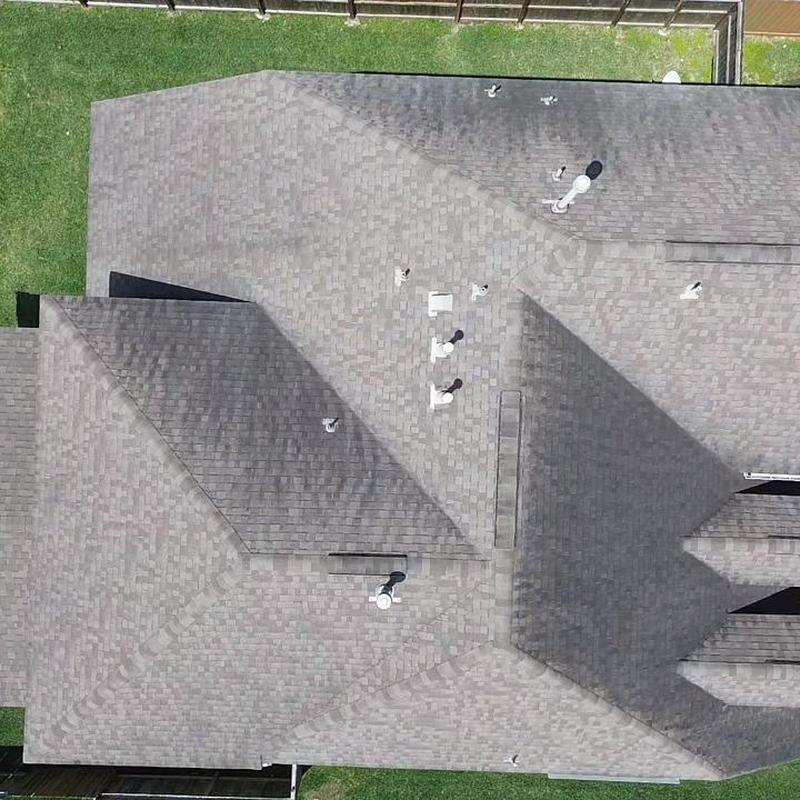 Asphalt shingle roof inspection after wind and hail damage