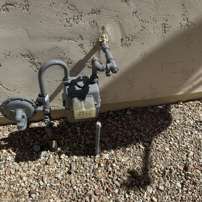 Gas meter and line inspection on exterior wall Gas meter and line inspection on exterior wall