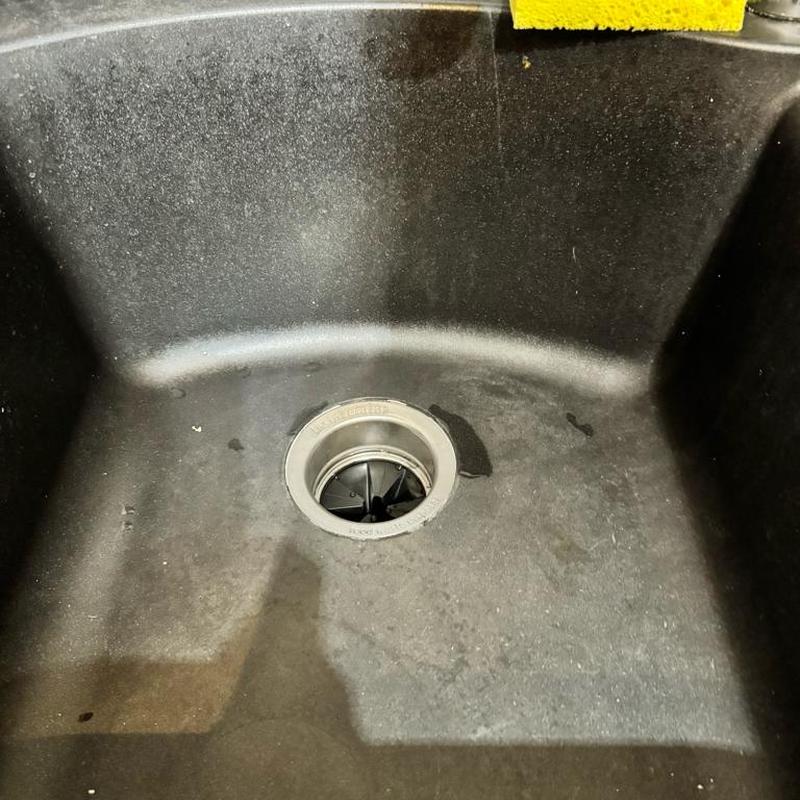 Kitchen sink with new drain flange installed