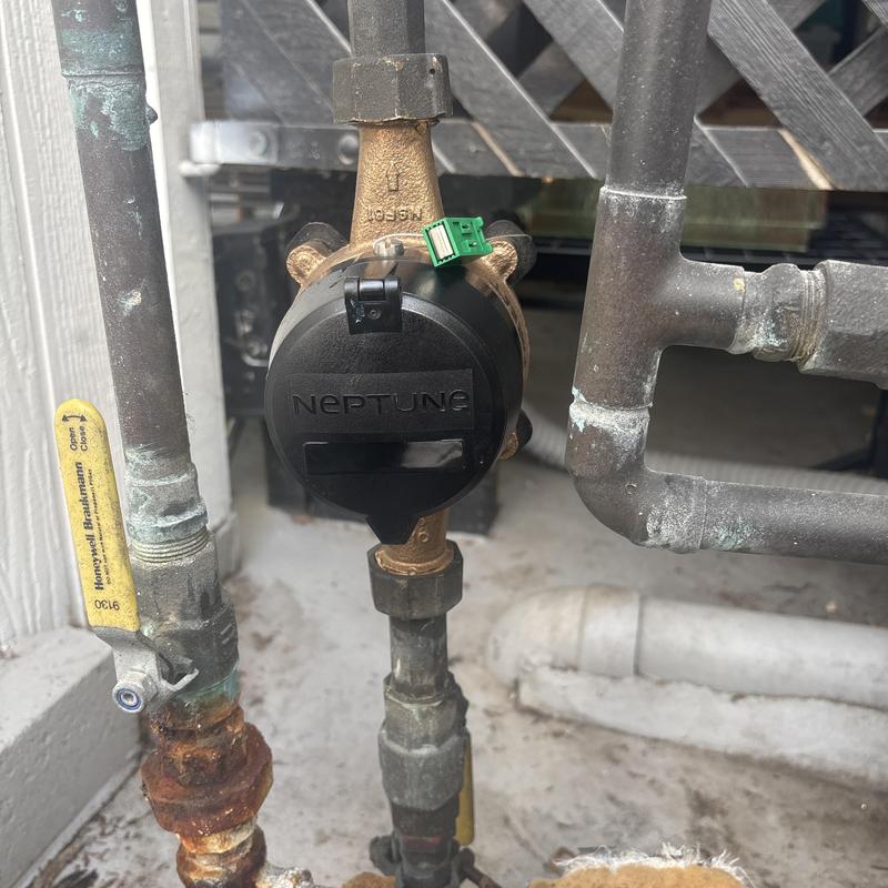 Water meter installation for mobile home plumbing system Water meter installation for mobile home plumbing system