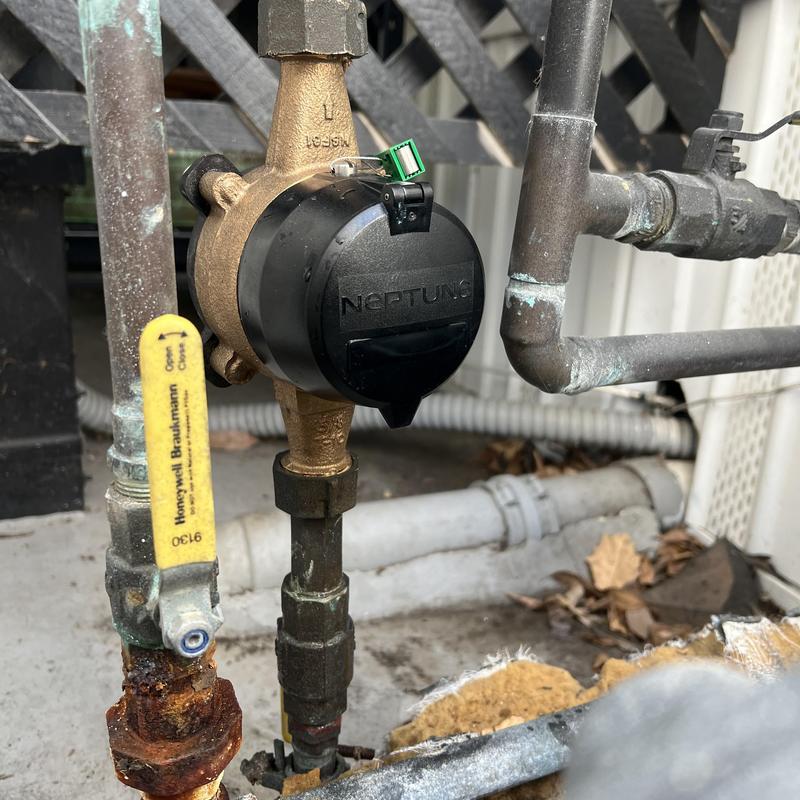 Water meter installation on outdoor plumbing pipes Water meter installation on outdoor plumbing pipes