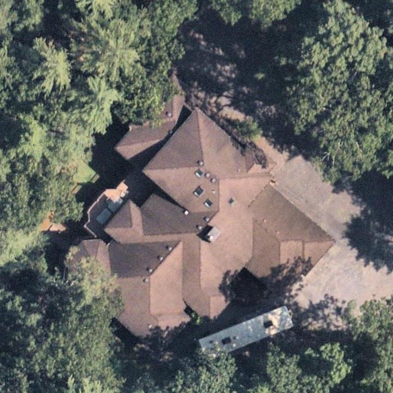 Roof shingles and vents on residential home aerial view Roof shingles and vents on residential home aerial view