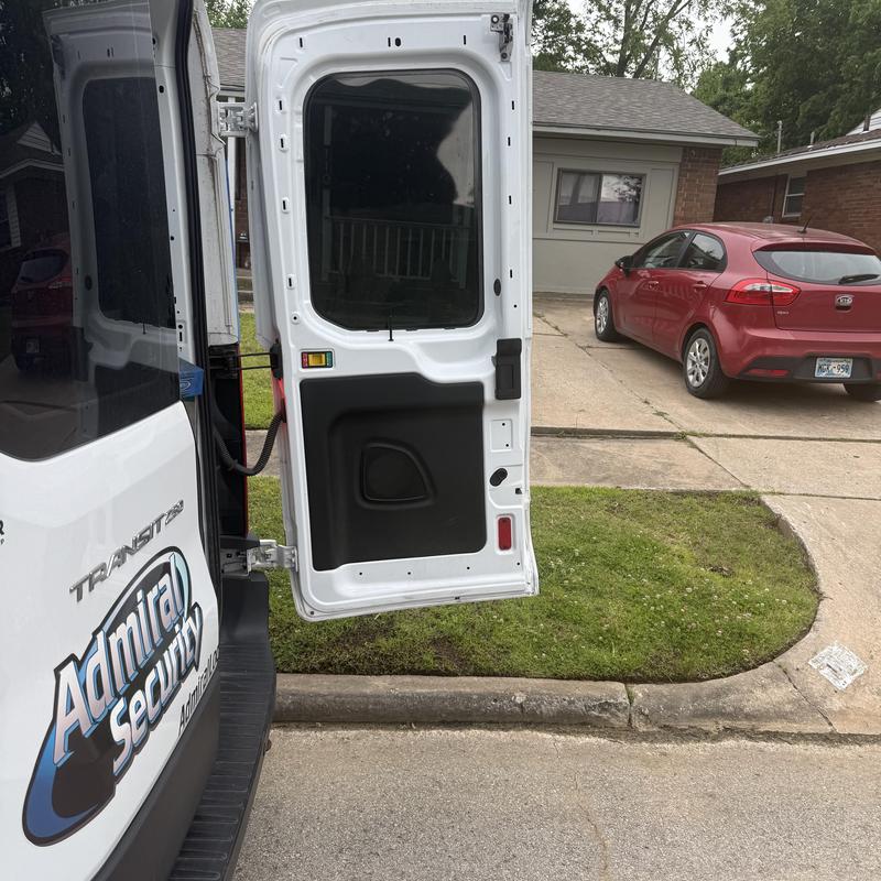 Van rear door lock open for customer access