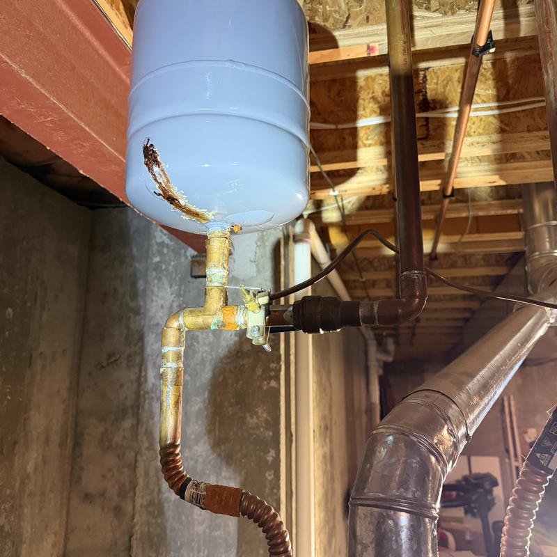 Expansion tank with corroded piping and fittings