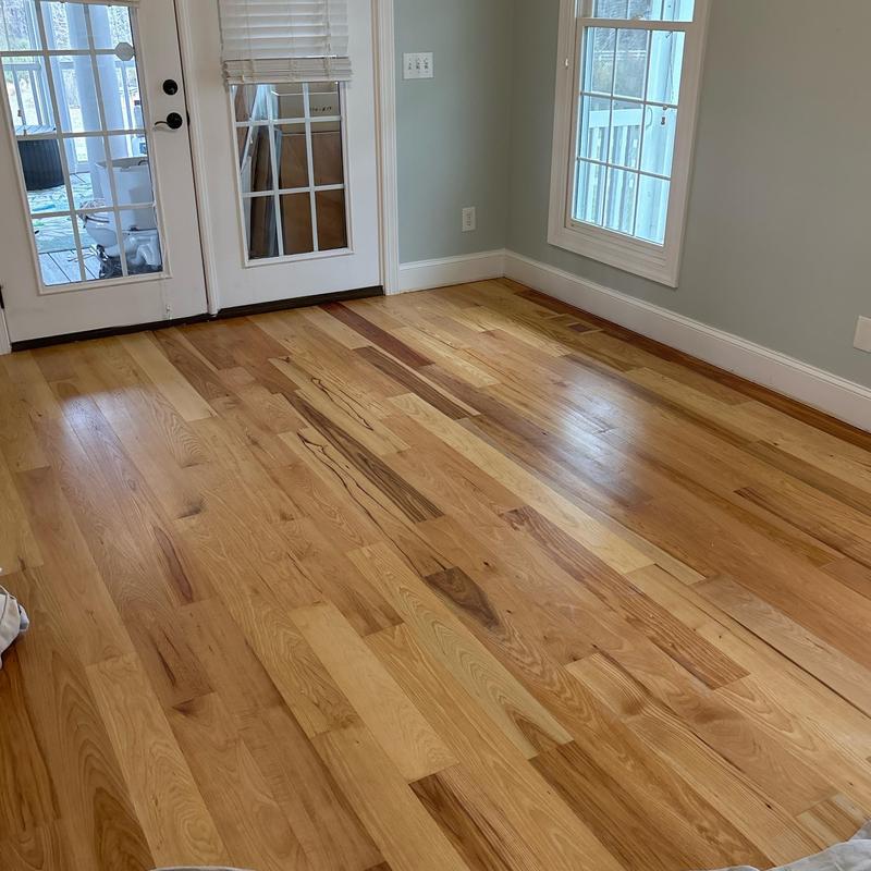 Hardwood flooring installation near window and door Hardwood flooring installation near window and door