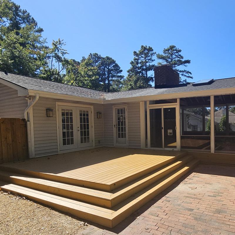 Wooden deck and screened porch addition in backyard Wooden deck and screened porch addition in backyard