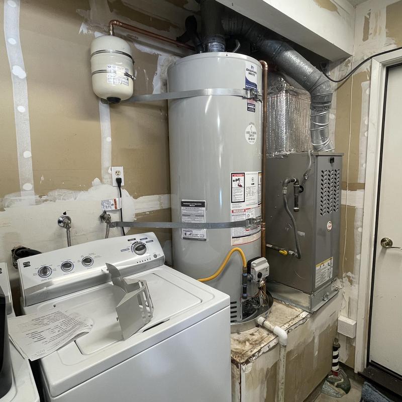50-gallon water heater with updated plumbing and code