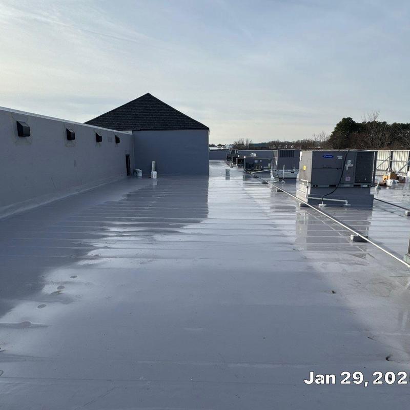 TPO roofing membrane layover on commercial roof