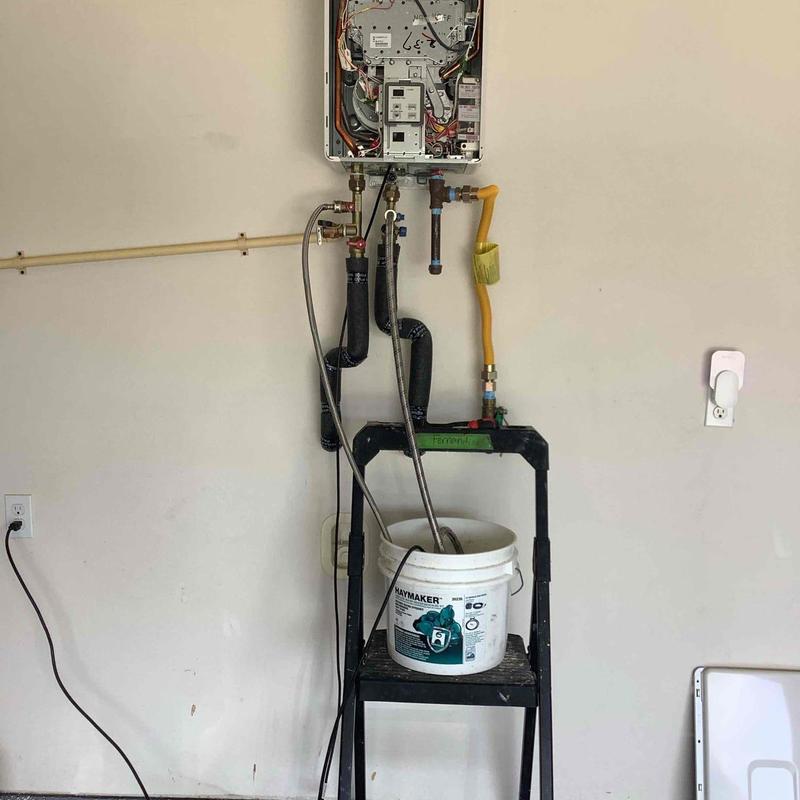 Tankless water heater heat exchanger flush setup