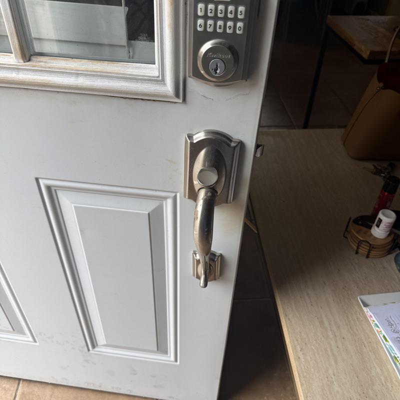 Kwikset keypad deadbolt installed on white door