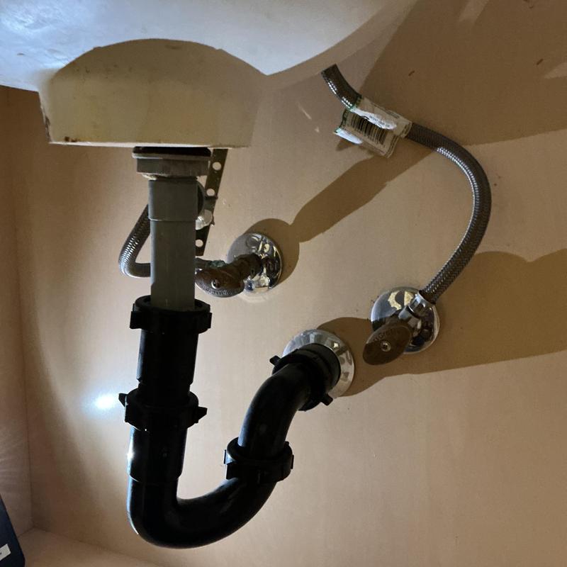 Lavatory drain trap with quarter turn angle stops and hoses Lavatory drain trap with quarter turn angle stops and hoses