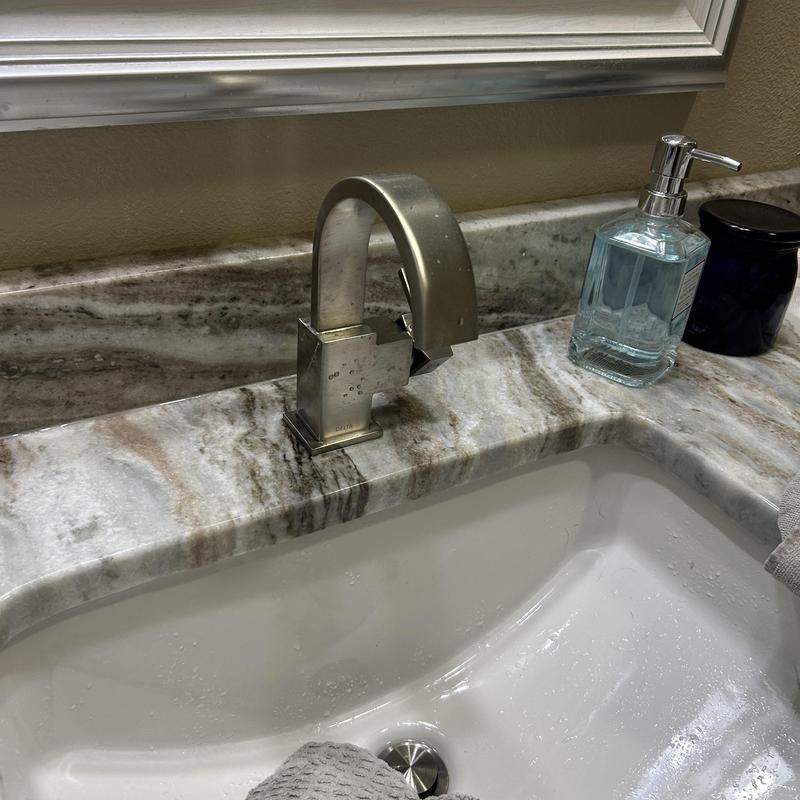 Laboratory faucet and sink countertop with soap dispenser