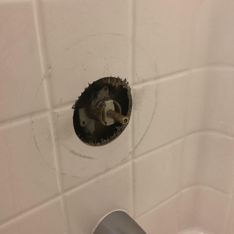 Moen shower valve removed from tiled wall