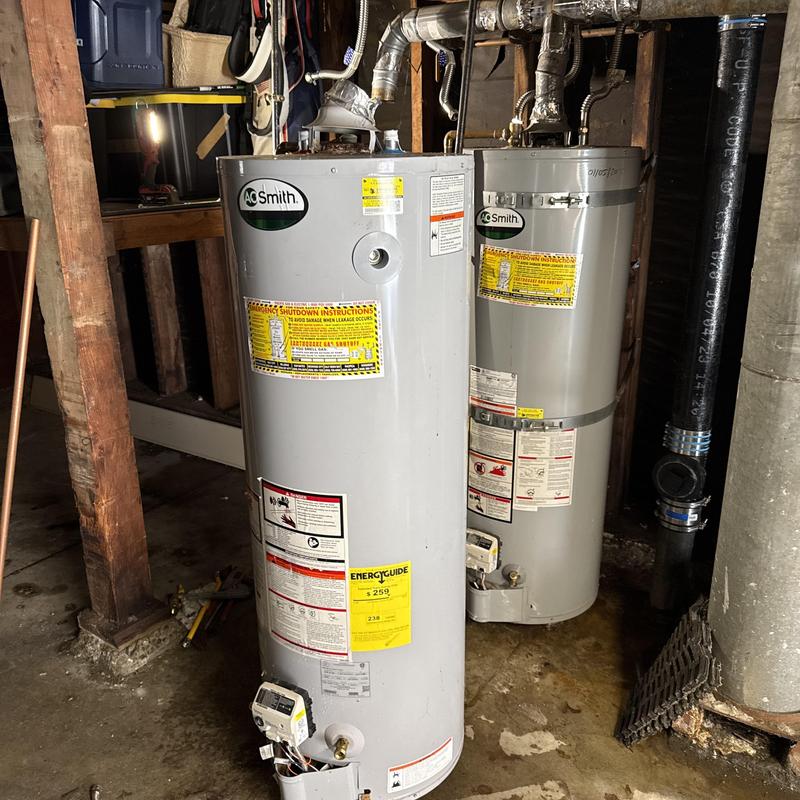 40-gallon AO Smith water heater installation with gas lines