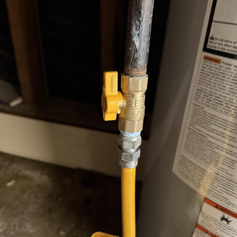 Gas valve and supply line on water heater installation