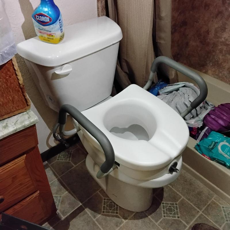 Western ADA height commode with handicap seat handles