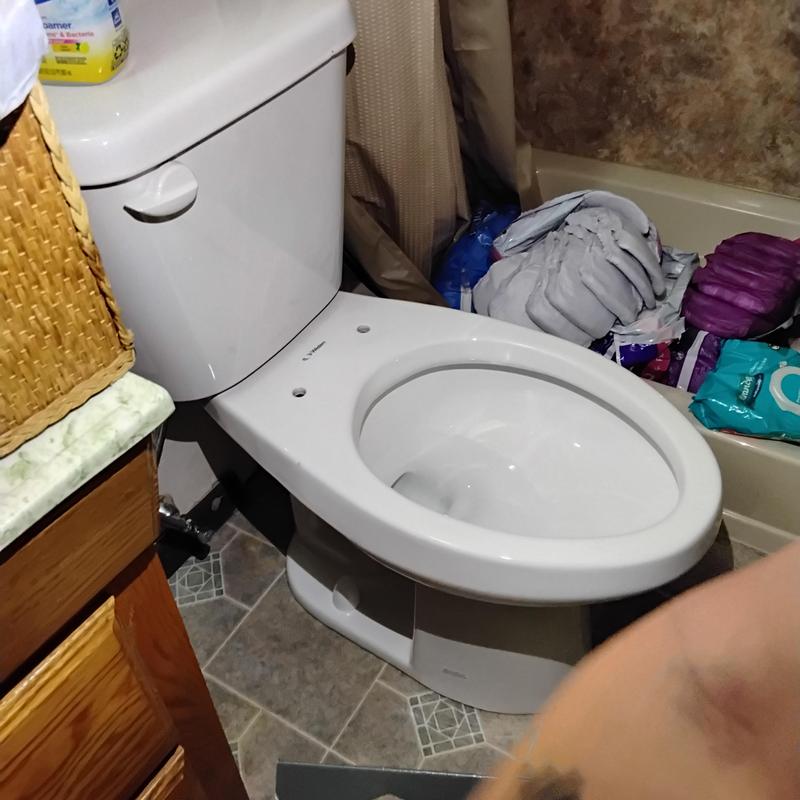 Western ADA height commode installation with handicap handles