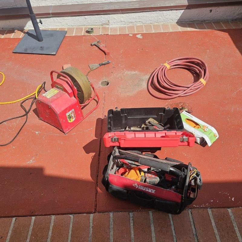 Outdoor drain cleaning machine and plumbing tools