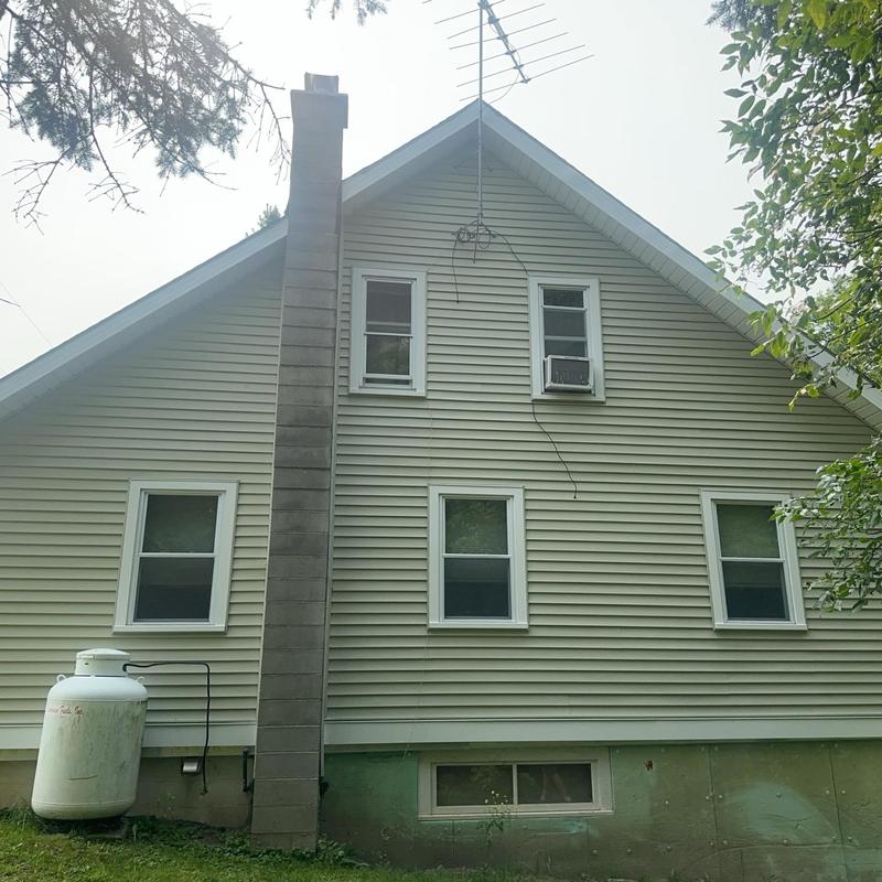 Vinyl siding and chimney exterior on residential home