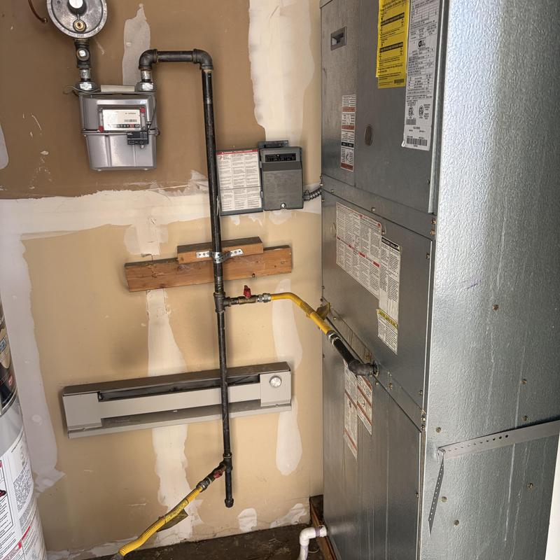 Gas meter and piping connected to HVAC unit