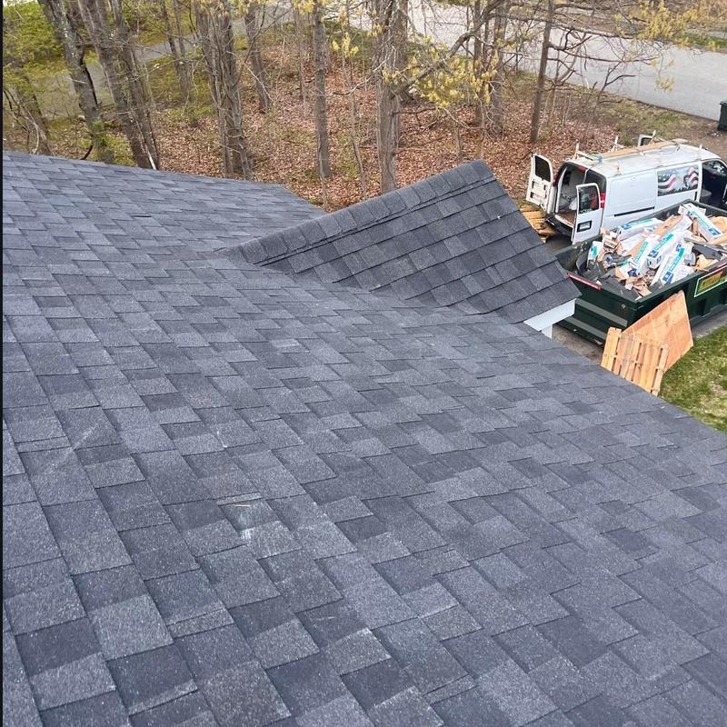 Asphalt shingle roof with roof valley installation
