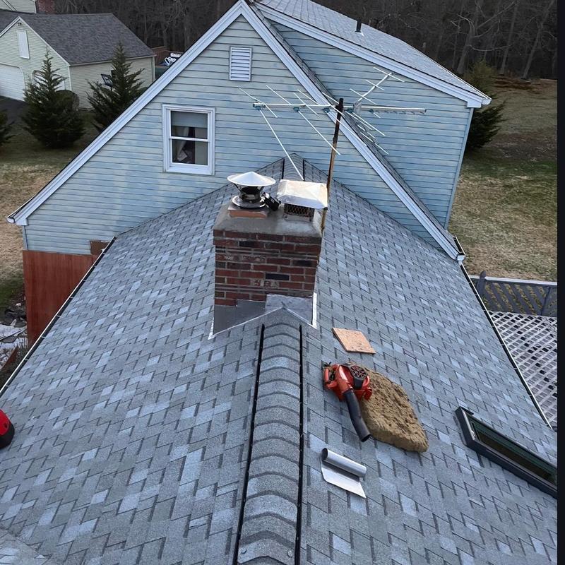 Cobblestone grey Landmark Pro roof with chimney work