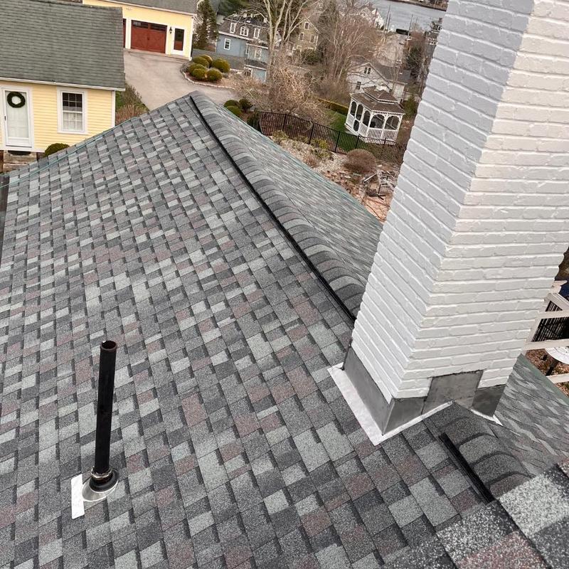 Landmark Pro Colonial Slate shingle roof with painted chimney