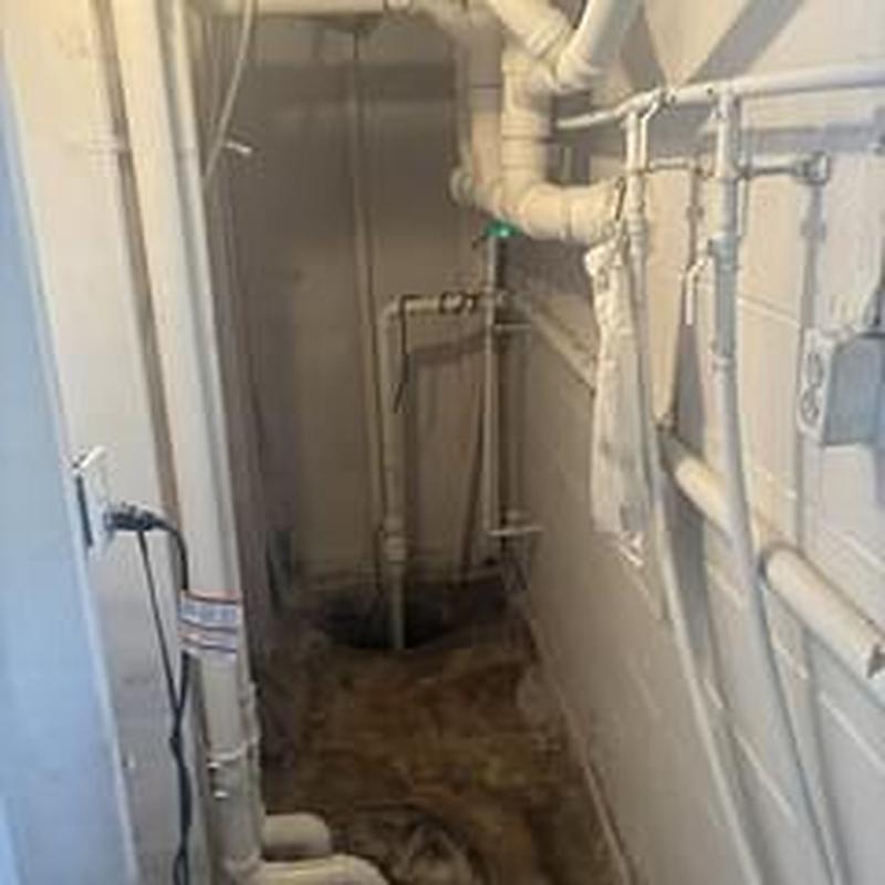 Zoller M63 sump pump installation in basement corner