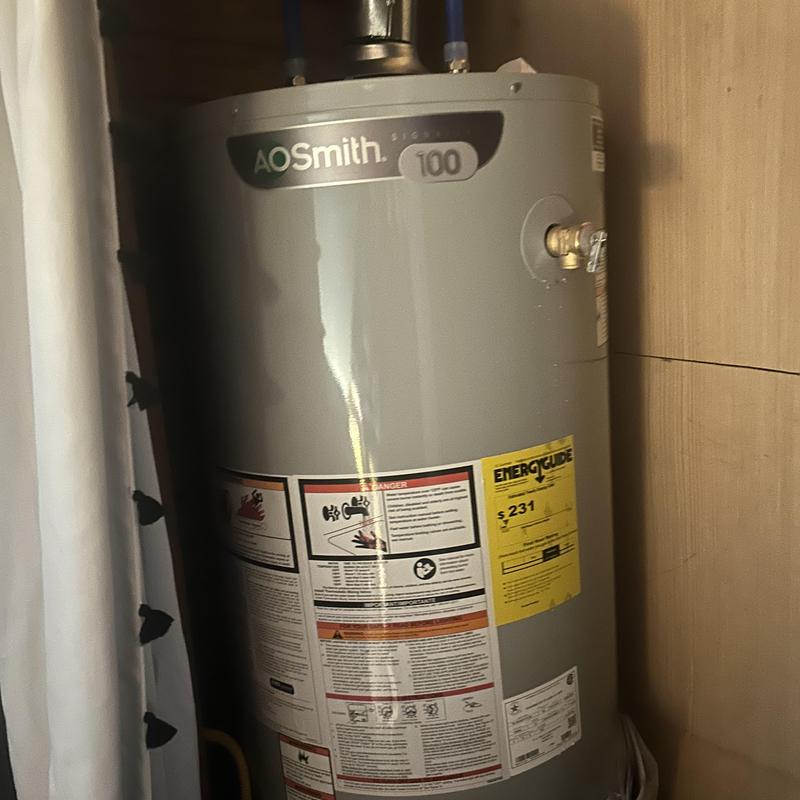 AO Smith water heater installation in utility closet AO Smith water heater installation in utility closet