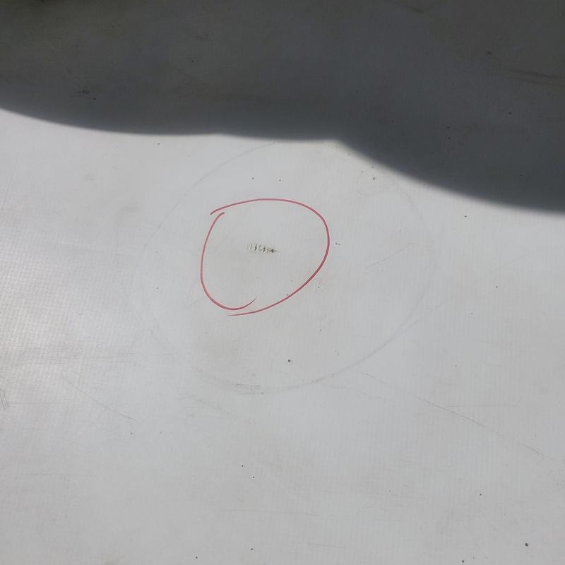 TPO flat roof puncture marked for repair