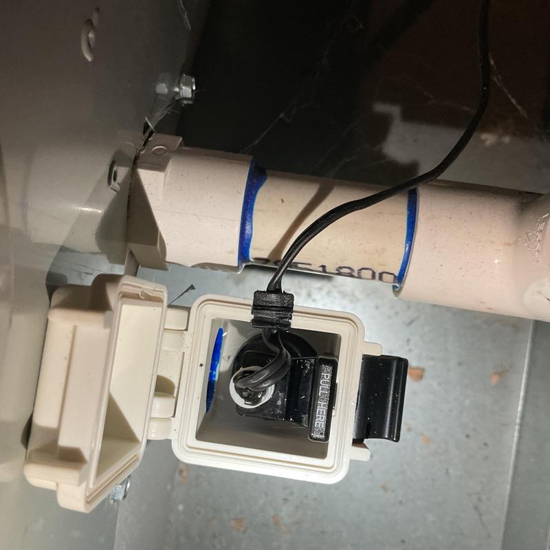 Coil overflow safety switch on HVAC drain line