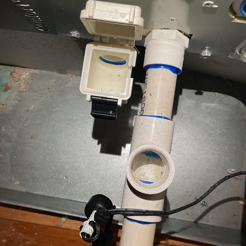 Coil overflow switch and PVC drain line in HVAC system