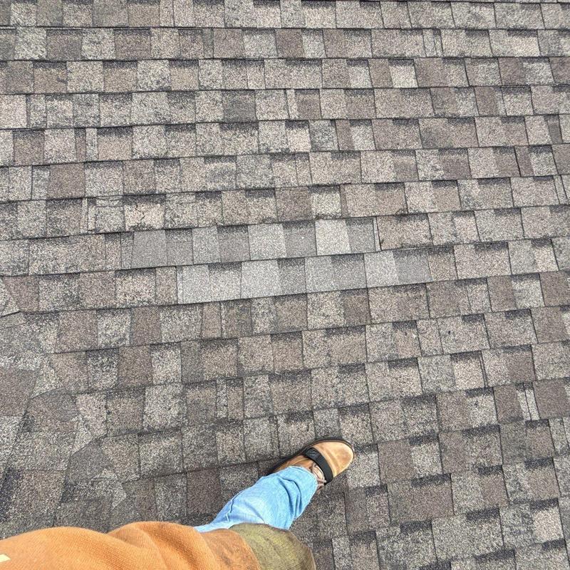 Asphalt shingle roof hail damage inspection with boots