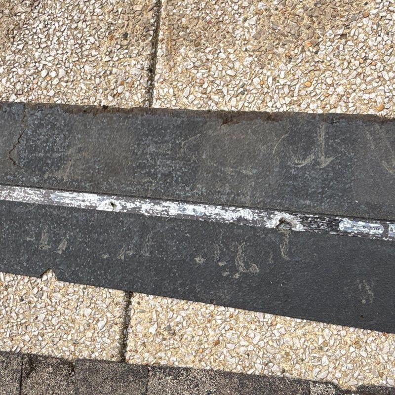 Roofing underlayment with hail damage and wear marks