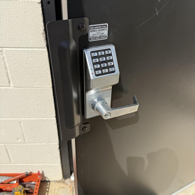 Keypad entry lock with latch guard and door closer