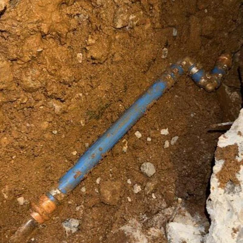Cold water line slab leak pipe in soil excavation
