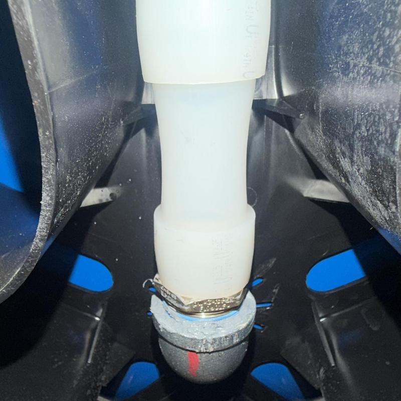 Water well pressure tank pipe connection with clamp
