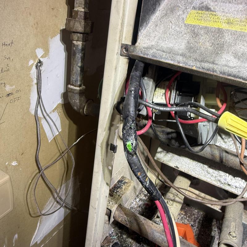 Blower motor wiring with visible heat damage Blower motor wiring with visible heat damage