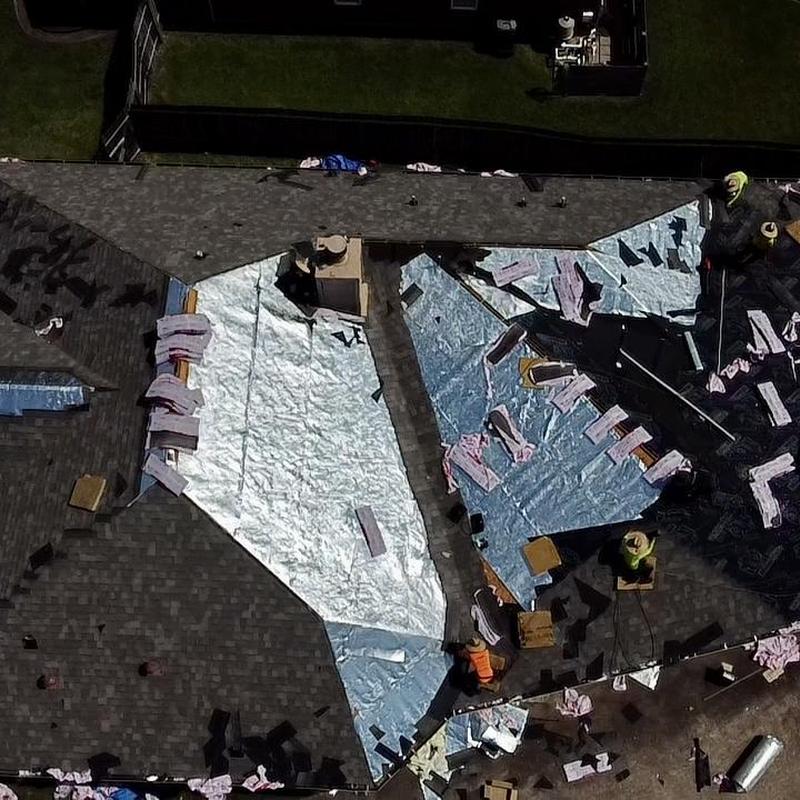 Radiant barrier installation on residential roof