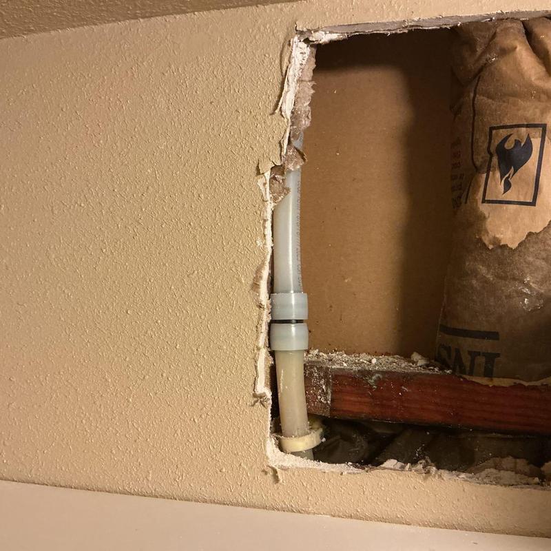 PEX pipe adapter installation inside wall cavity