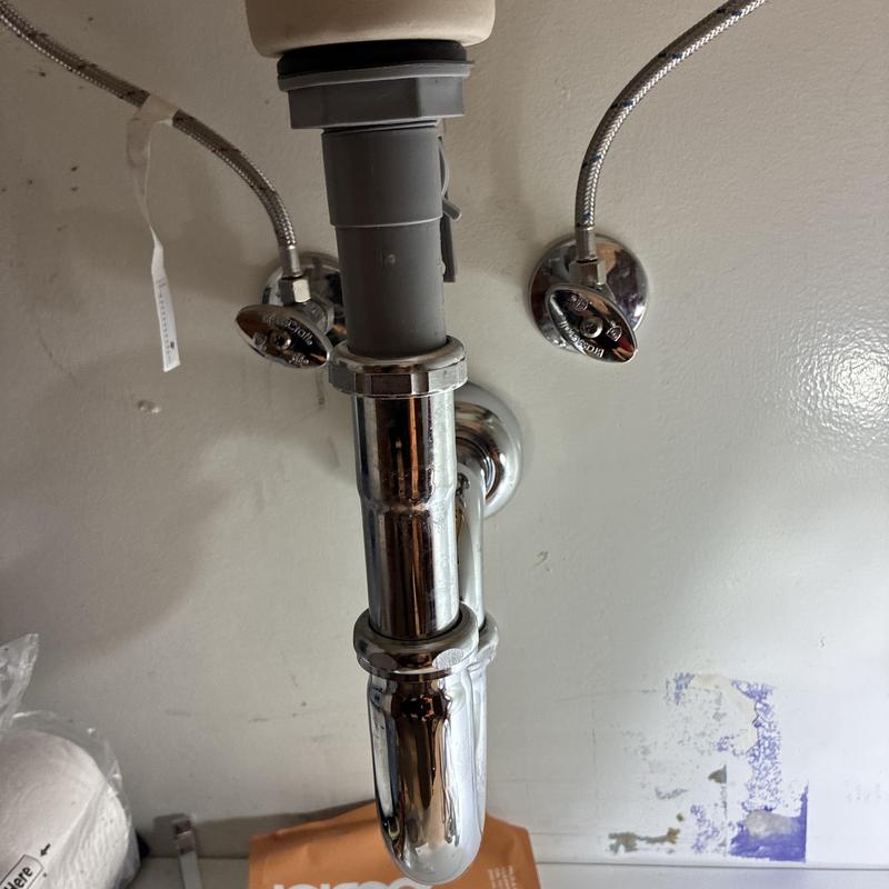 Bathroom sink drain and faucet supply lines installation