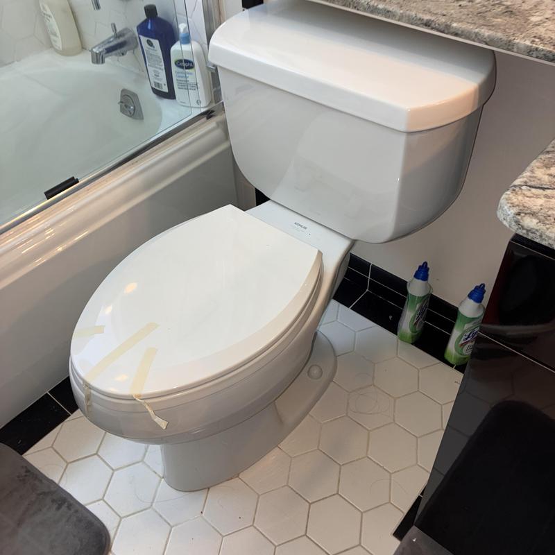 Flushmate toilet system with replaced cartridge and valve