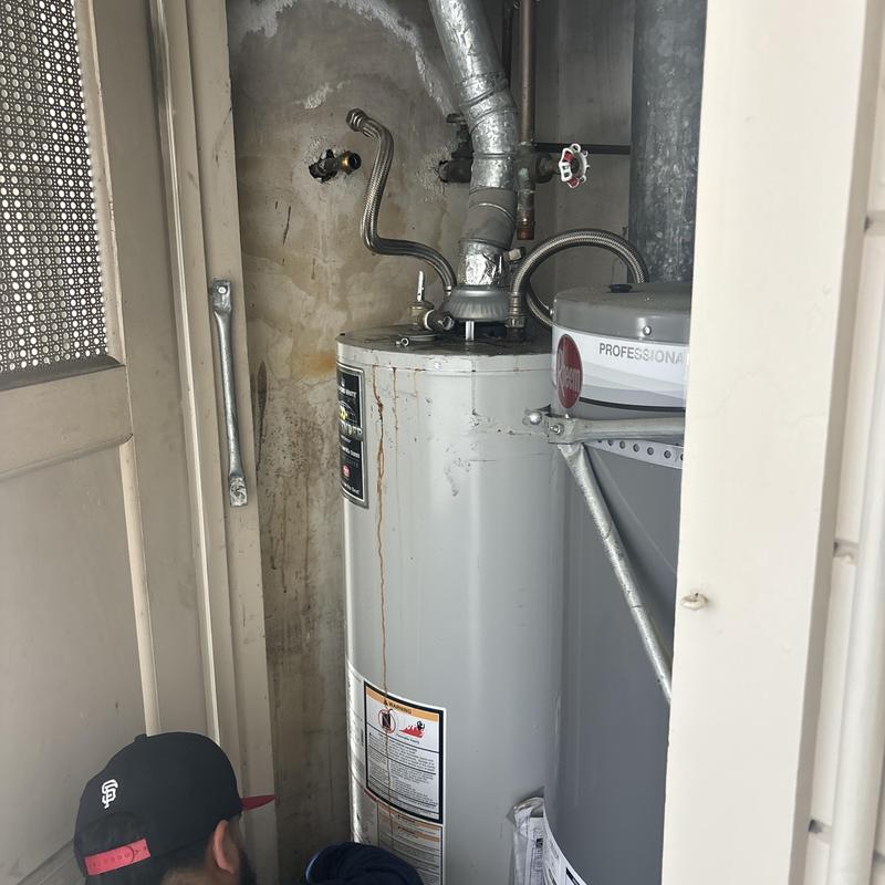 Water heater with old gas and water lines